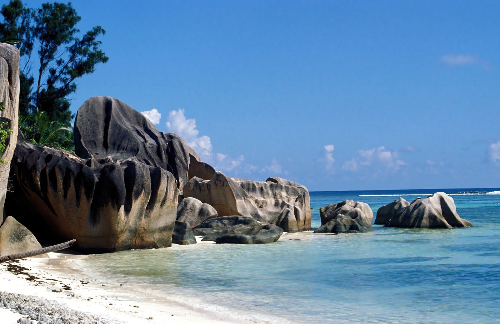 Granite boulders on a white beach at La Digue, Seychelles